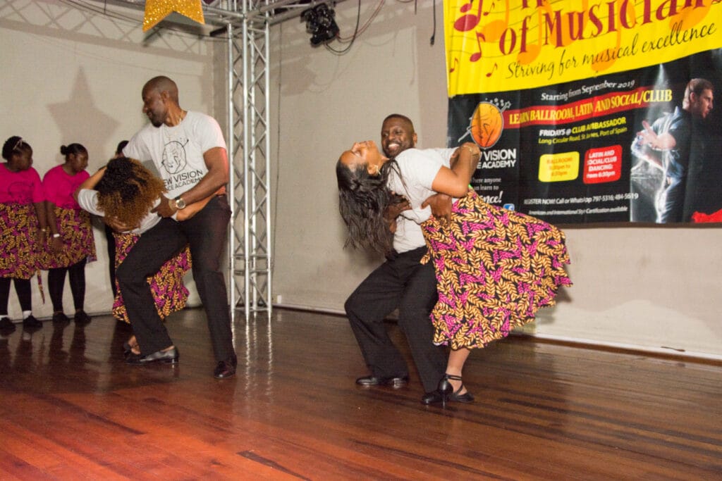 Adults Dancing Salsa On Stage